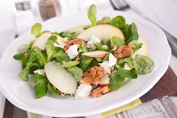 Salad with apple and walnuts — Stock Photo, Image