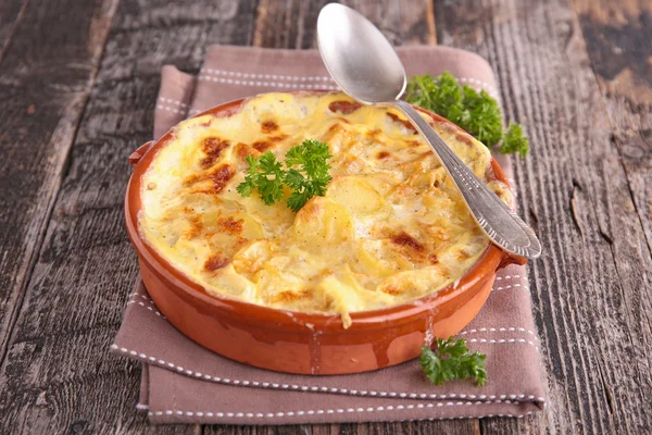 Baked potato with cheese and cream — Stock Photo, Image