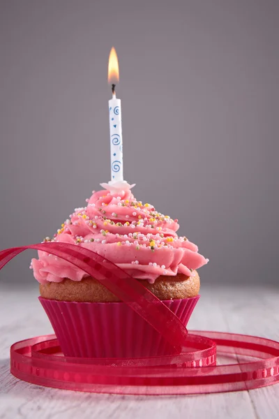 Birthday cupcake with candle — Stock Photo, Image