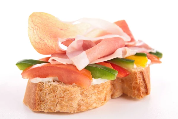 Bruschetta bread with prosciutto — Stock Photo, Image