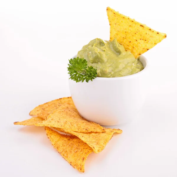 Tortilla chipsy a guacamole — Stock fotografie