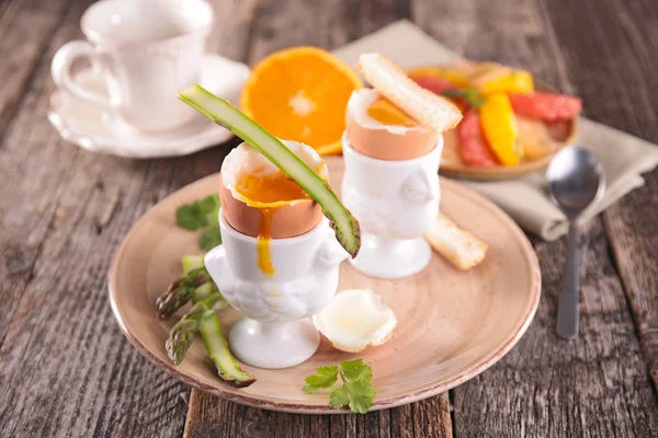 Soft boiled egg and asparagus — Stock Photo, Image