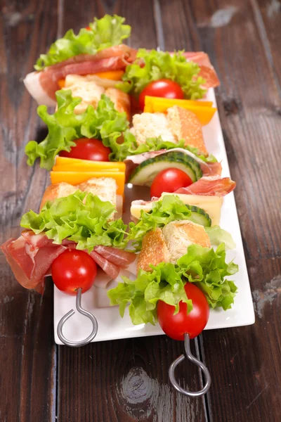 Sandwich skewers with bread and ham — Stock Photo, Image