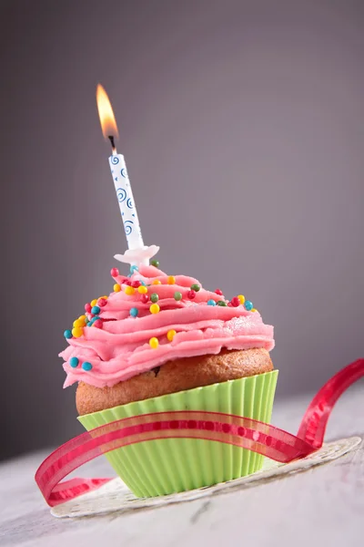 Birthday cupcake with candle — Stock Photo, Image