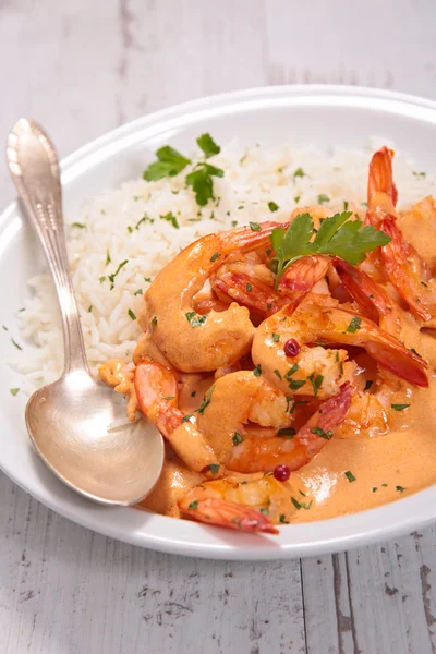 Shrimps with curry sauce — Stock Photo, Image