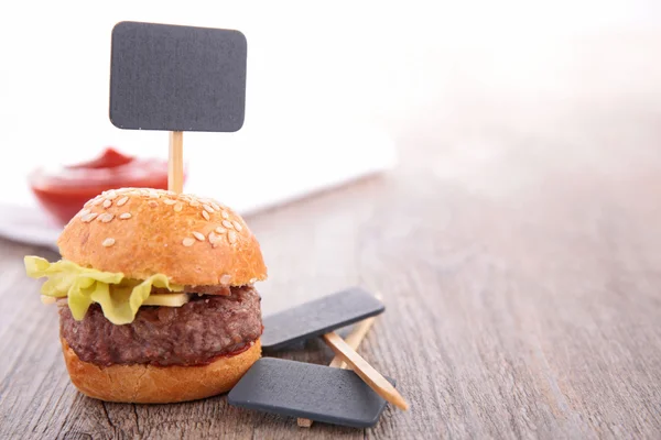 Hamburger with blank banner — Stock Photo, Image