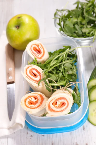 lunch box with salmon wraps