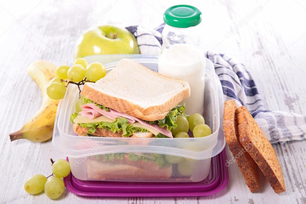 Sandwich, lunch box and fruits — Stock Photo © studioM #98107926