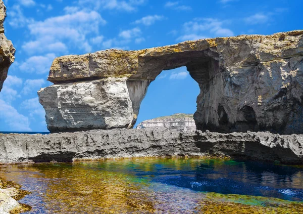 Window, famous stone arch of Gozo island in the sun in summer, Malta — Stock Photo, Image