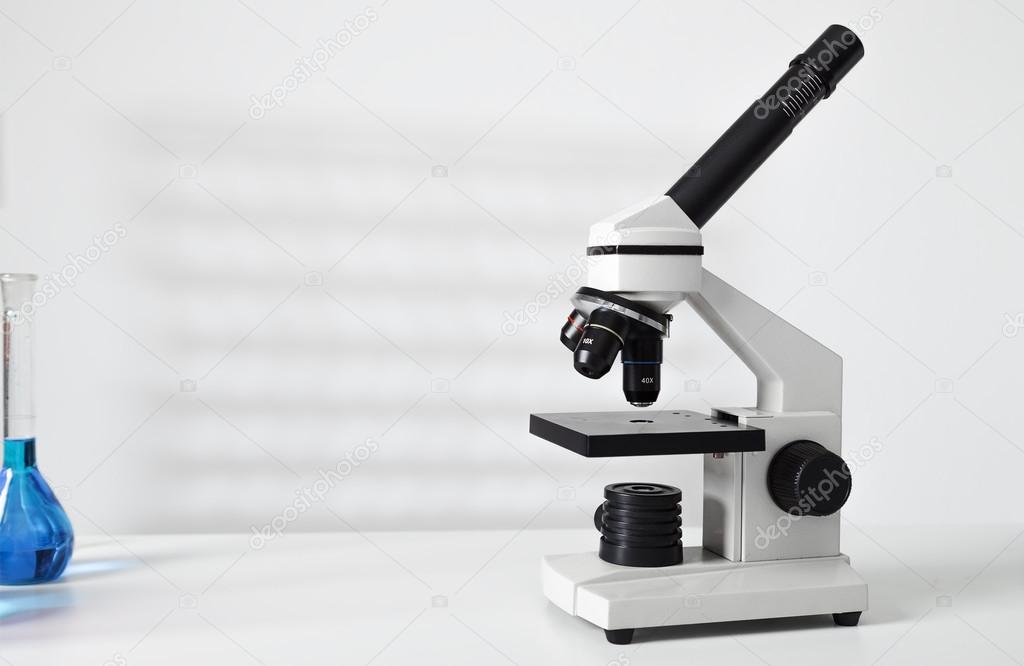 Laboratory microscope lens.modern microscopes in a lab. Stock Photo by