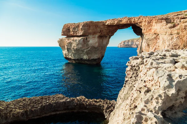 Azure Window, famous stone arch of Gozo island in the sun in summer, Malta