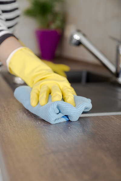 hand with glove using cleaning  Kitchen