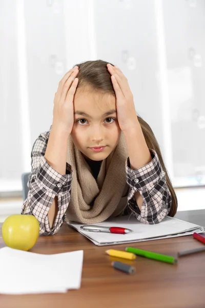 Little girl working on her school project at home. — Stock Photo, Image