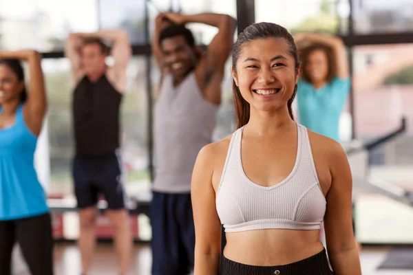 Young Asian woman in a gym — Stock Photo, Image