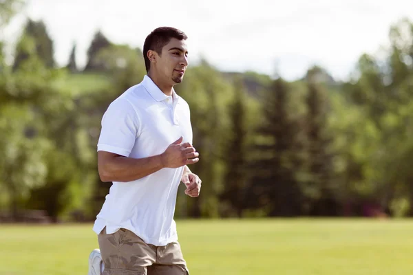 Young Man Jogging in the Park — Stock Photo, Image