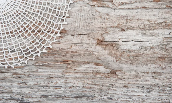 Koronki tkaniny na Stare drewno — Zdjęcie stockowe