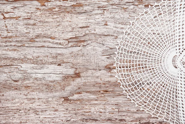 Lace fabric on the old wood — Stock Photo, Image