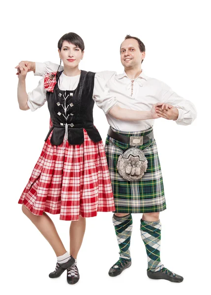 O par mulher e homem dançando dança escocesa — Fotografia de Stock