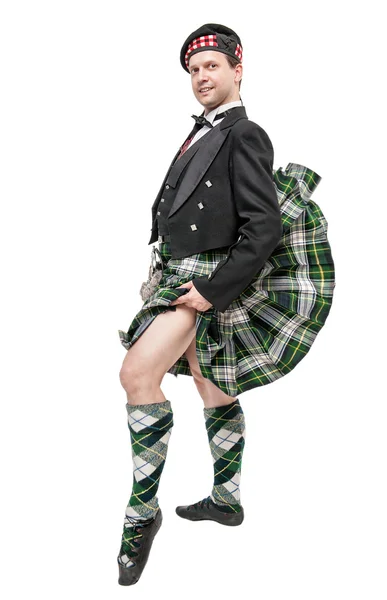 Szkocki człowieka w tradycyjnym stroju narodowego dmuchaną kilt — Zdjęcie stockowe