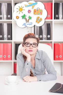 Bored business woman dreaming about holiday in office clipart