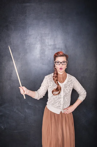 Surprised teacher with pointer — Stock Photo, Image