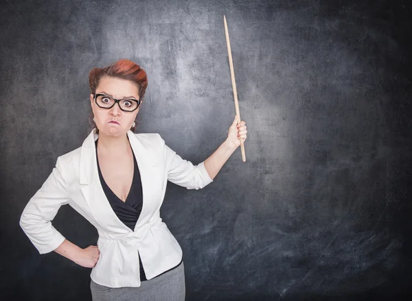 Angry teacher with pointer — Stock Photo, Image