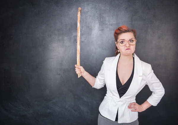 Angry teacher with pointer — Stock Photo, Image