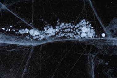 Çizikler ve donmuş baloncuklarla kaplı buz dokusu. Desenleme için Winer soyut arkaplanı