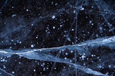 Çizikler ve donmuş baloncuklarla kaplı buz dokusu. Desenleme için Winer soyut arkaplanı