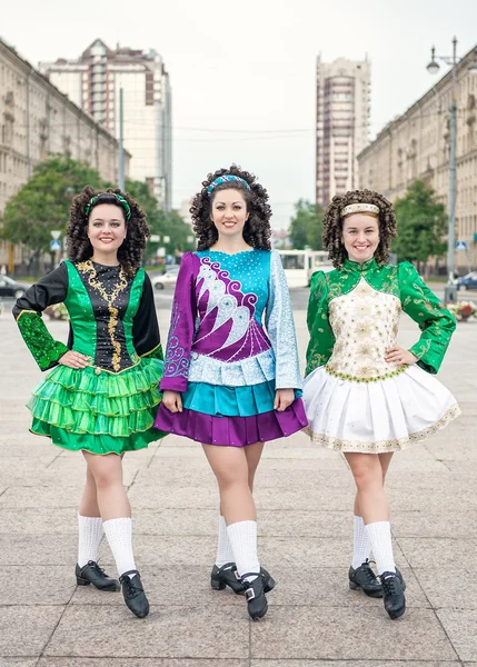Three women in irish dance dresses posing — Stock Photo, Image