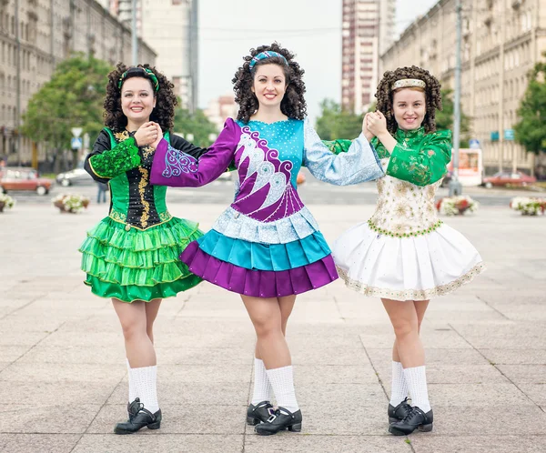 Three women in irish dance dresses posing — Stock Photo, Image