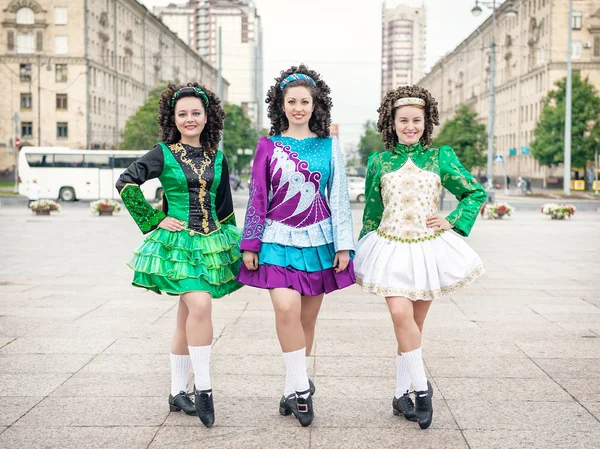 Three women in irish dance dresses posing — Stock Photo, Image