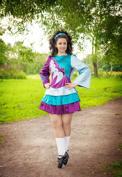 Young beautiful girl in irish dance dress posing outdoor — Stock Photo, Image