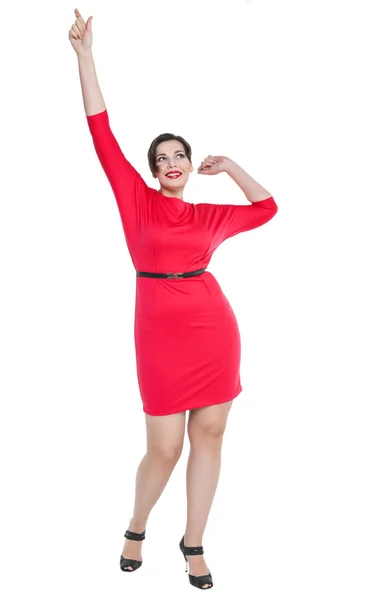 Beautiful plus size woman in red dress — Stock Photo, Image