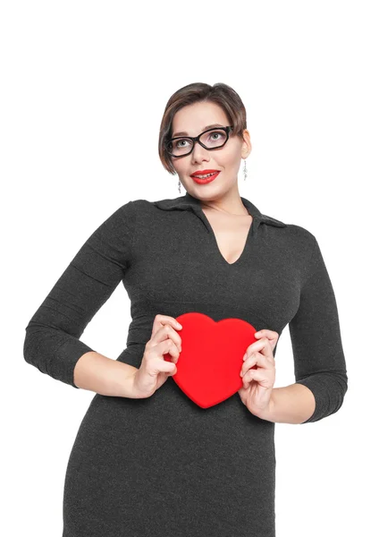 Beautiful plus size woman with red heart — Stock Photo, Image