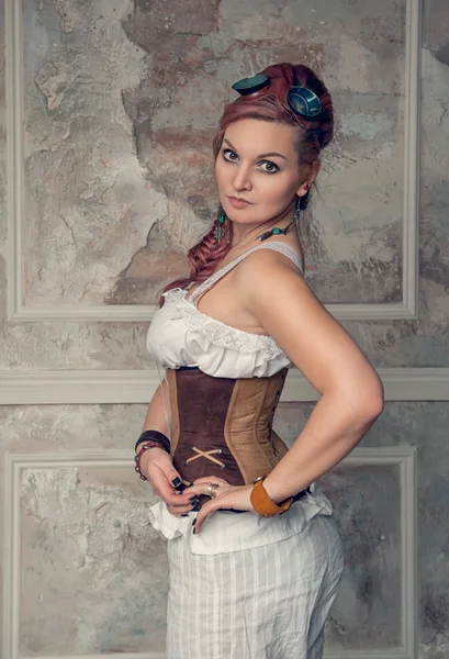 Beautiful steampunk woman with pink hair — Stock Photo, Image