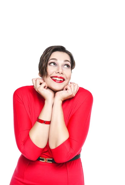 Feliz hermosa mujer de talla grande en vestido rojo mirando algo —  Fotos de Stock