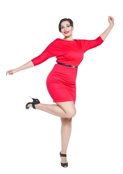 Happy beautiful plus size woman in red dress with hands up — Stock Photo, Image