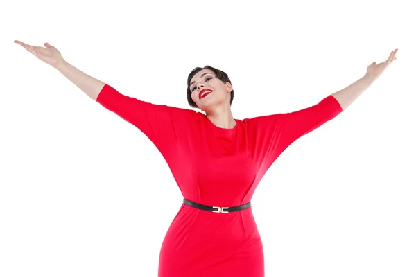 Feliz mulher bonita plus size em vestido vermelho com as mãos para cima isola — Fotografia de Stock