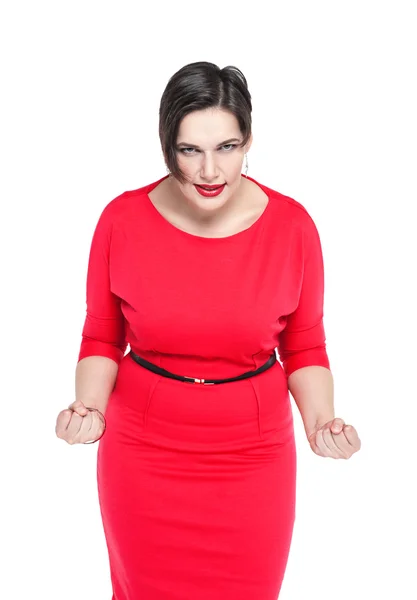 Angry beautiful plus size woman in red dress isolated — Stock Photo, Image