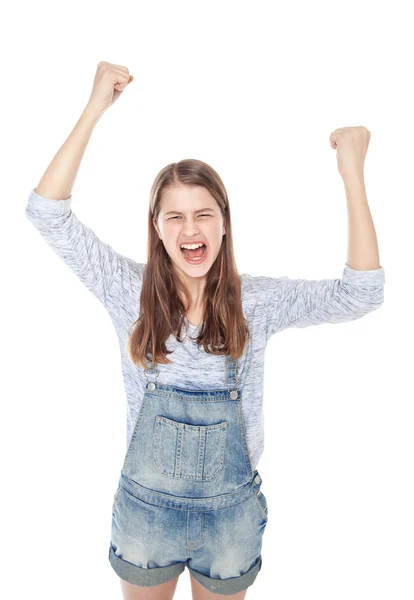 Angry young fashion girl in jeans overalls screaming isolated — Stock Photo, Image
