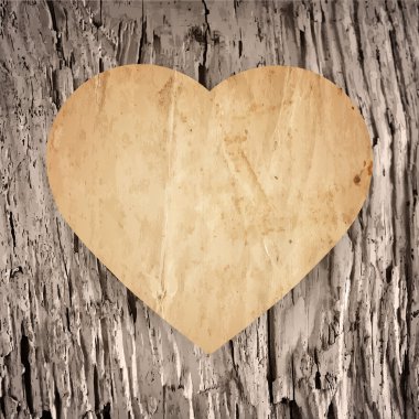 Kağıt kalp eski ahşap arka plan üzerinde