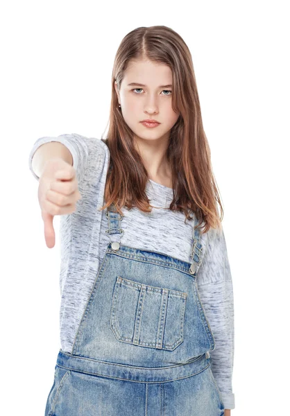 Ung tonårstjej med tumme ner gest isolerade — Stockfoto