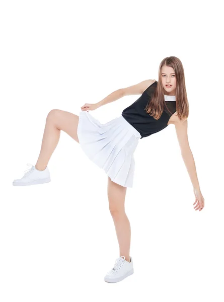 Young fashion girl in white skirt posing isolated — Stock Photo, Image