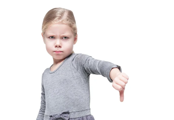 Beautiful little girl showing thumbs down isolated — Stock Photo, Image