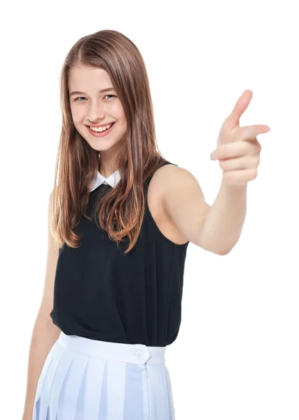 Young beautiful teenager girl showing gun sign isolated — Stock Photo, Image