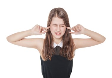 Young beautiful teenager girl plugging ears with fingers isolate clipart