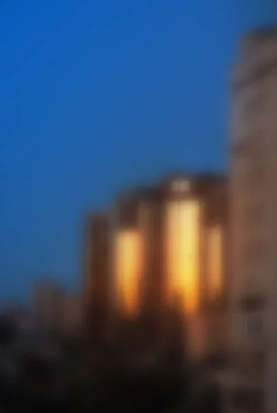 Blurred background with sunrise reflection on the building — Stock Photo, Image