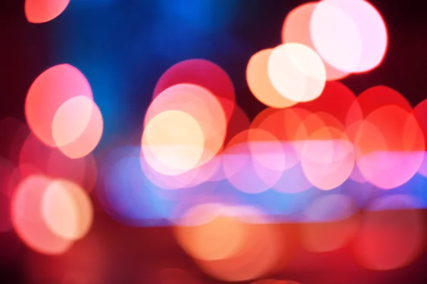 Abstract colorful blurred background with defocused lights — Stock Photo, Image