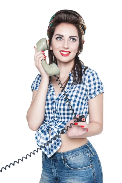 Unga vackra kvinnan i pin-up stil med retro telefon isola — Stockfoto